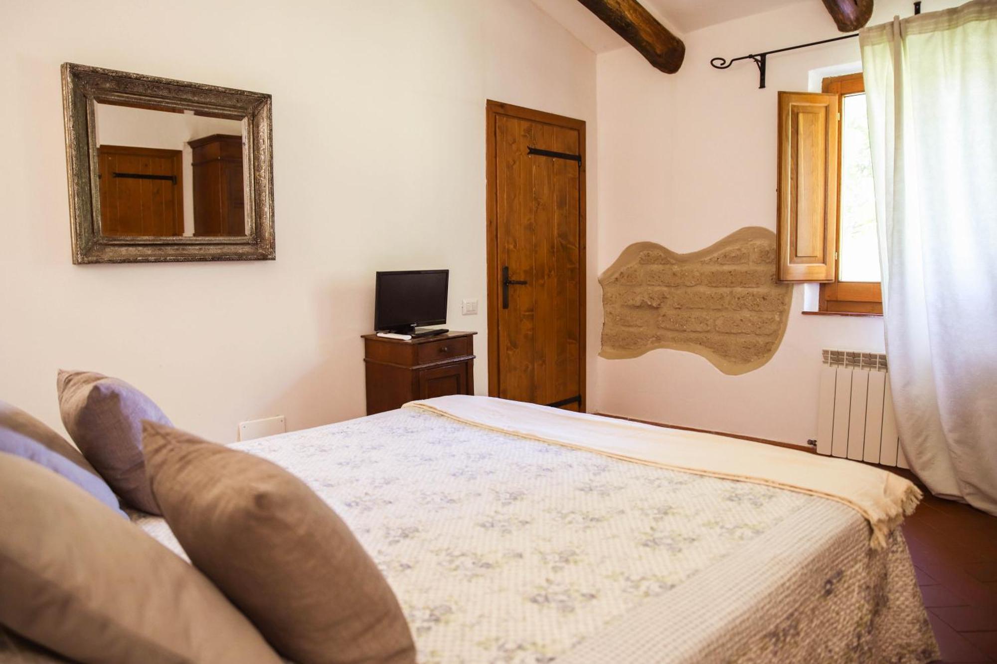 Bio Agriturismo Poggio Aione Сатурния Экстерьер фото